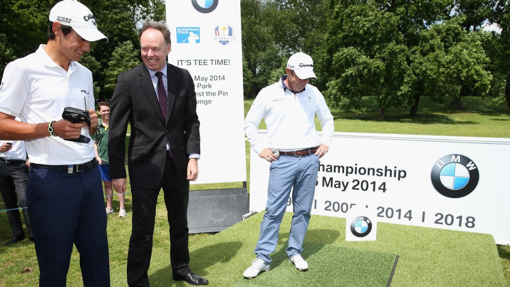 (L-R) Matteo Manassero ; Dr.Ian Robertson, Member of the Board of Manangement of BMW AG and Paul McGinley play with the remote control car after Manassero won the 