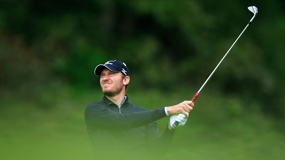 Chris Wood hits his third shot into the 18th