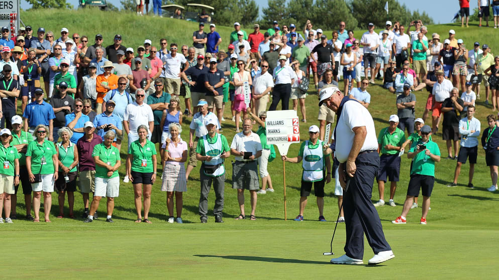 Colin Montgomerie on the 18th green at Simon's Golf Club