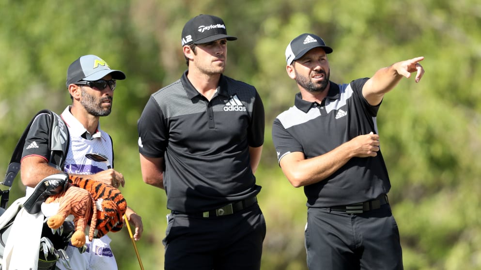 Nacho Elvira and Sergio Garcia during the third round at the Omega Dubai Desert Classic