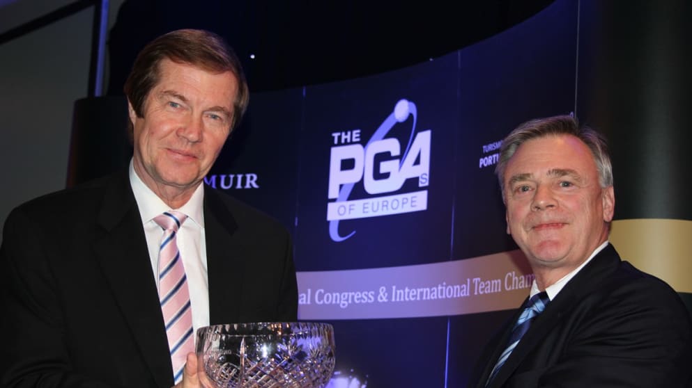 George O’Grady being presented with the Christer Lindberg Bowl by Ken Schofield at the 22nd Annual PGAs of Europe Congress in Vilamoura, Portugal