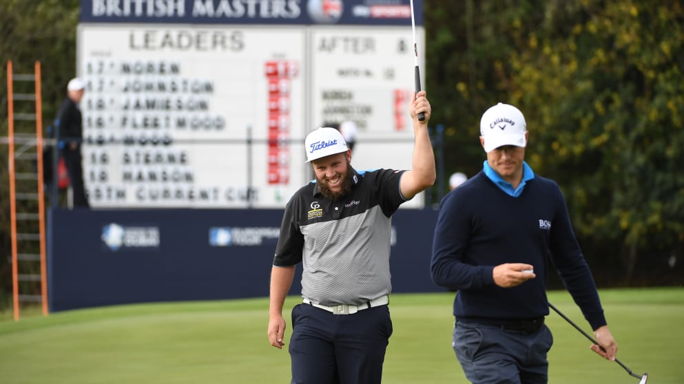 Andrew Johnston  celebrates his birdie on the ninth hole 