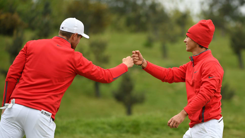 Thorbjorn Olesen and Lucas Bjerregaard - celebrate a birdie on the 5th green on day one of the Golf Sixes