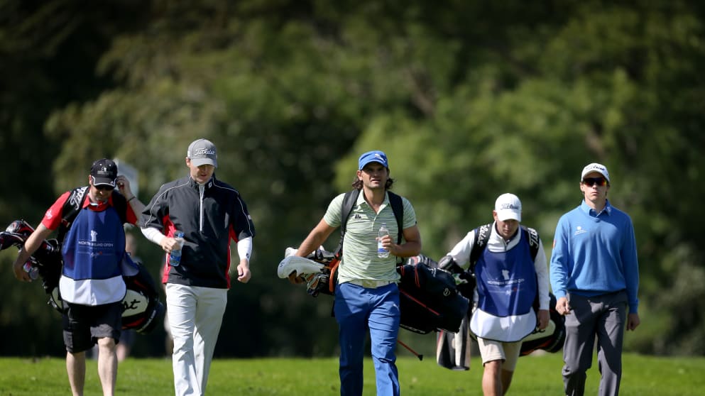 Michael Hoey, Johan Edfors and Jordi Garcia Pinto stride down the fairway at the Northern Ireland Open Challenge in association with Maui Jim Sunglasses (Matt Mackey / Press Eye)