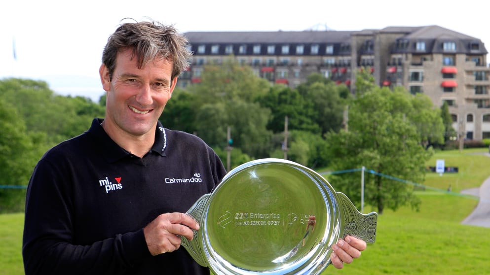Paul Wesselingh raises the trophy after victory over  Roman Road Course, Celtic Manor Resort