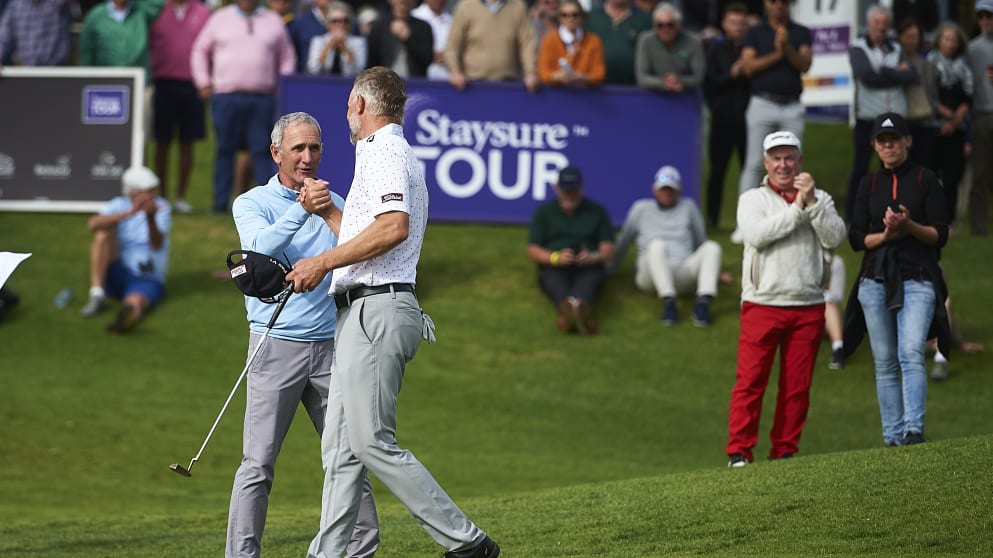 Euan McIntosh and Michael Long embrace 