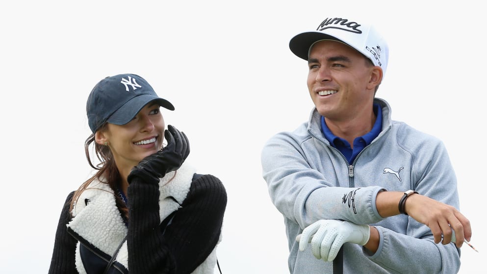 Happy to be back? Rickie Fowler and his girlfriend, Alexis Randock look on during practice