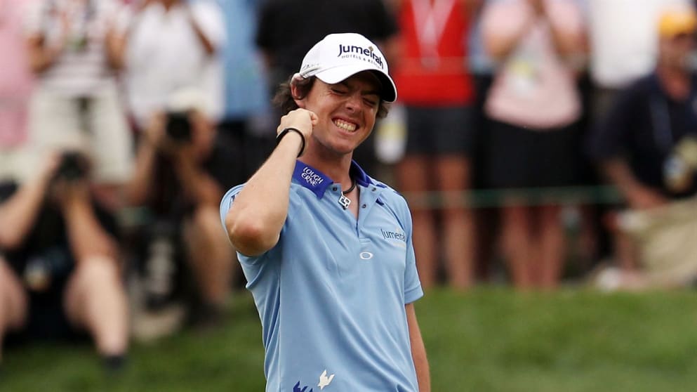 Rory McIlroy celebrates his eight-stroke victory 