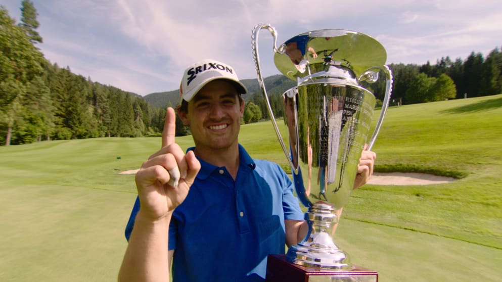 Darius van Driel with the Euram Bank Open trophy