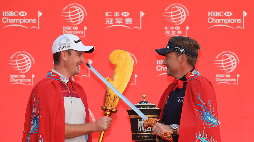 Justin Rose (L) and Ian Poulter of England 