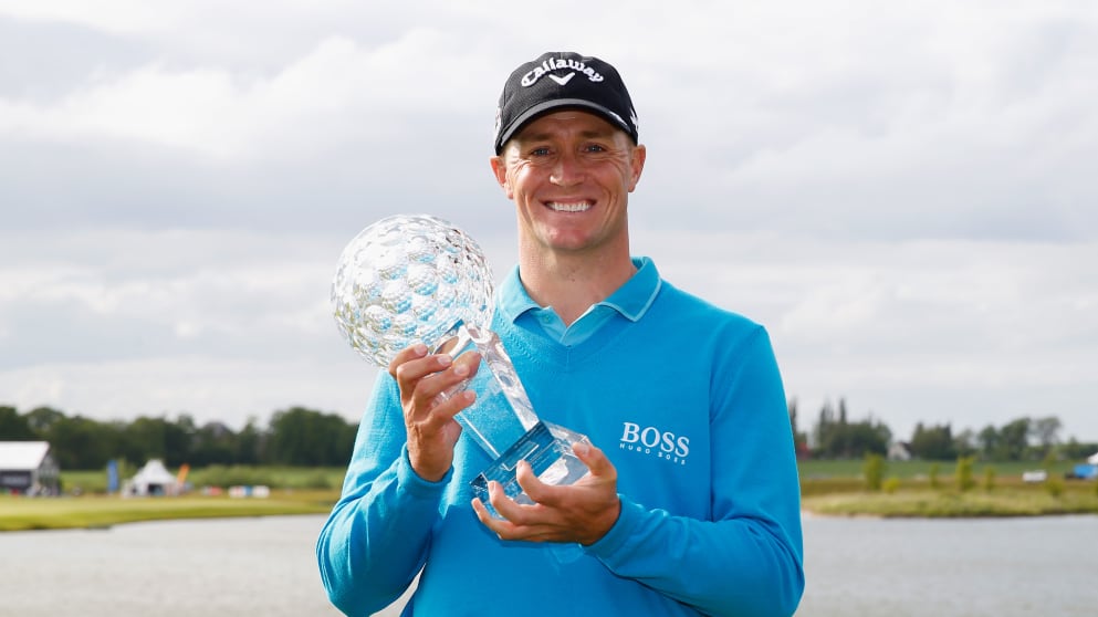Alex Noren celebrates a victory after a -12 score at the Nordea Masters
