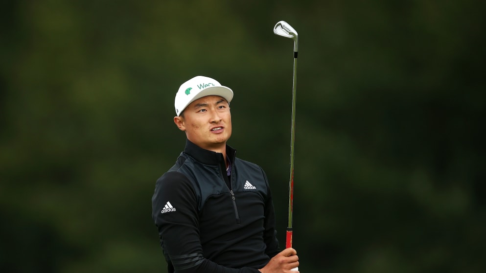 Li Haotong of China looks on at the tenth hole