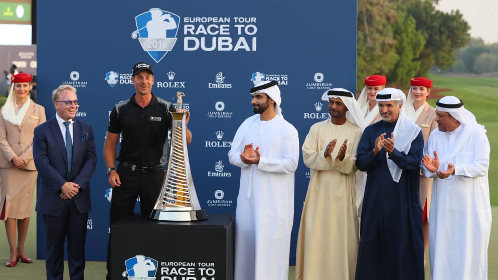 Henrik Stenson receives the Race to Dubai trophy 