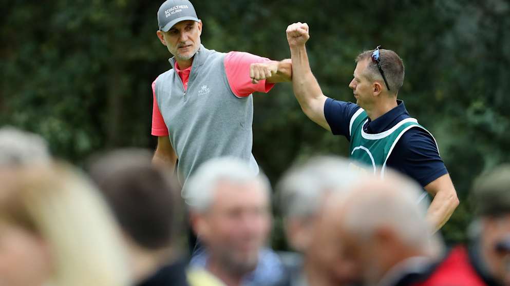André Bossert with his caddie Karl Young