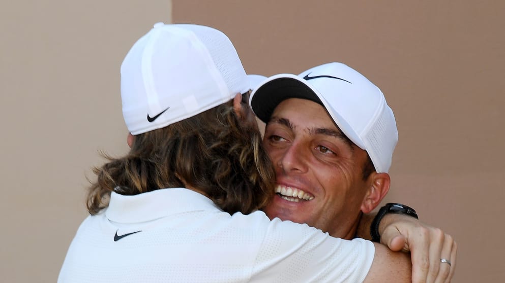 Fleetwood and Molinari hug
