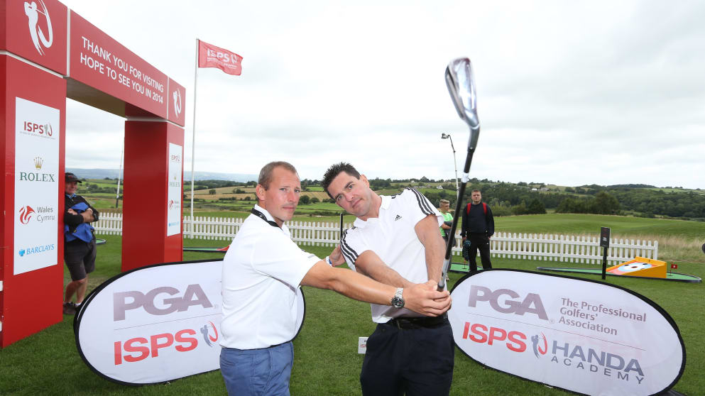 Welsh Paralympic Gold Medallist, Mark Colbourne receiving top tips from ISPS HANDA PGA Academy Pro, Craig Thomas at Celtic Manor Resort during the ISPS HANDA Wales Open (Sporting Wales)