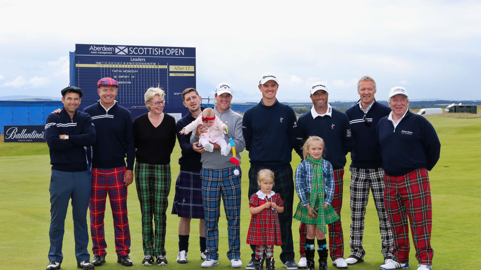 Dougray Scott, Gavin Hastings, Sophie Dow, Chris McGregor daughter, Eloise, being held by Marc Warren, Justin Rose, Ryan Palmer, Rory Bremner, Martin Gilbert. Front row: Jessica Donaldson and Emma Rule