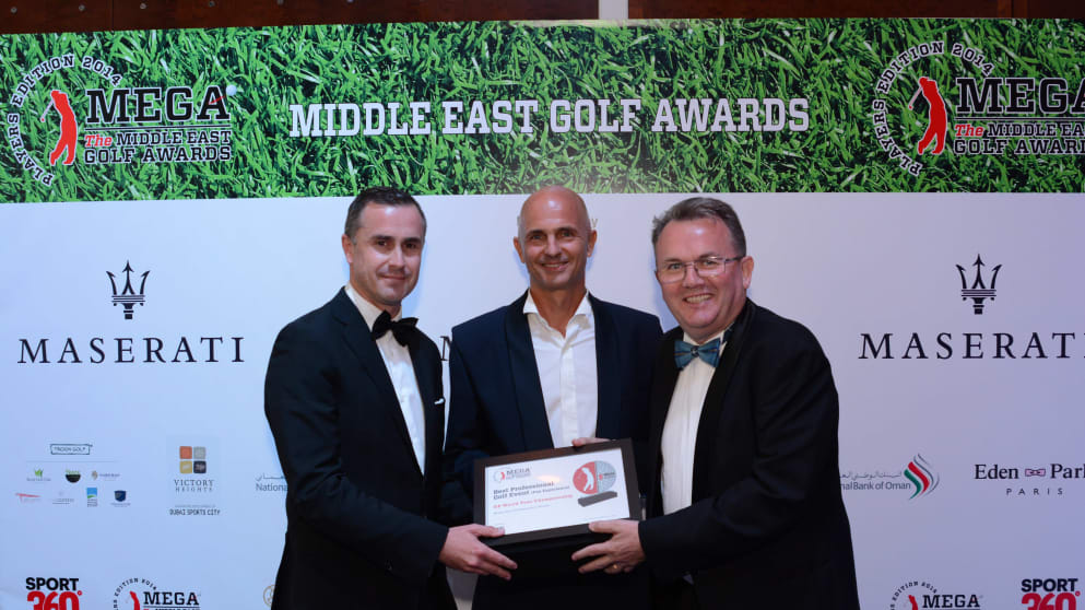 Nick Tarratt (right), along with Neal Graham (left, General Manager Jumeirah Golf Estates, Golf Operations) collecting the Best Professional Golf Event, Fan Experience Award for the 2013 DP World Tour Championship from Didier Bruin (centre) of Sport360