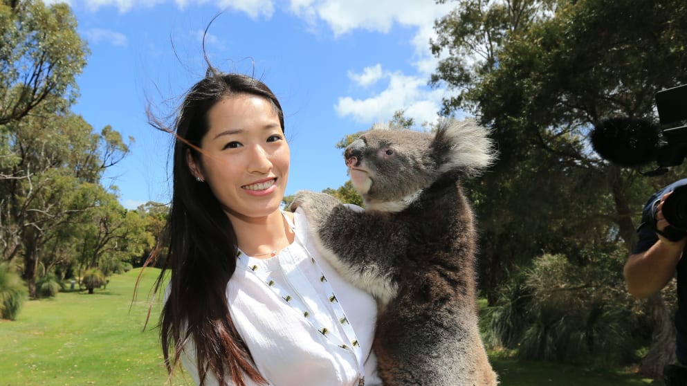 Olympic gold medal winning Chinese swimmer Luo Xuejuan and friend at the ISPS Handa Perth International