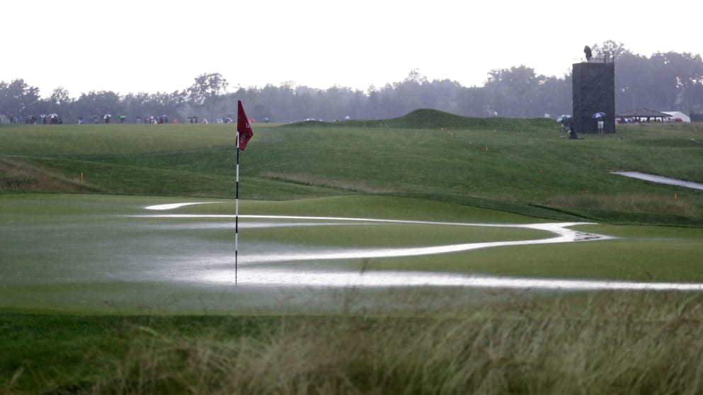 The flooded fifth green during the first round