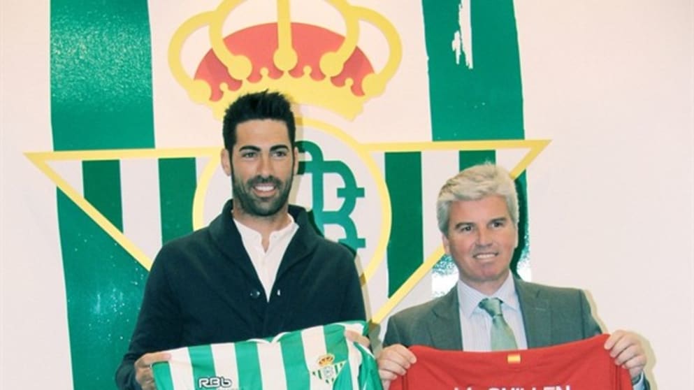 Alvaro Quiros with Betis President Miguel Guillen