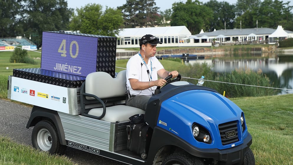 A referee drives a buggy with an electronic clock display during the Pro-Am of The 2018 Shot Clock Masters