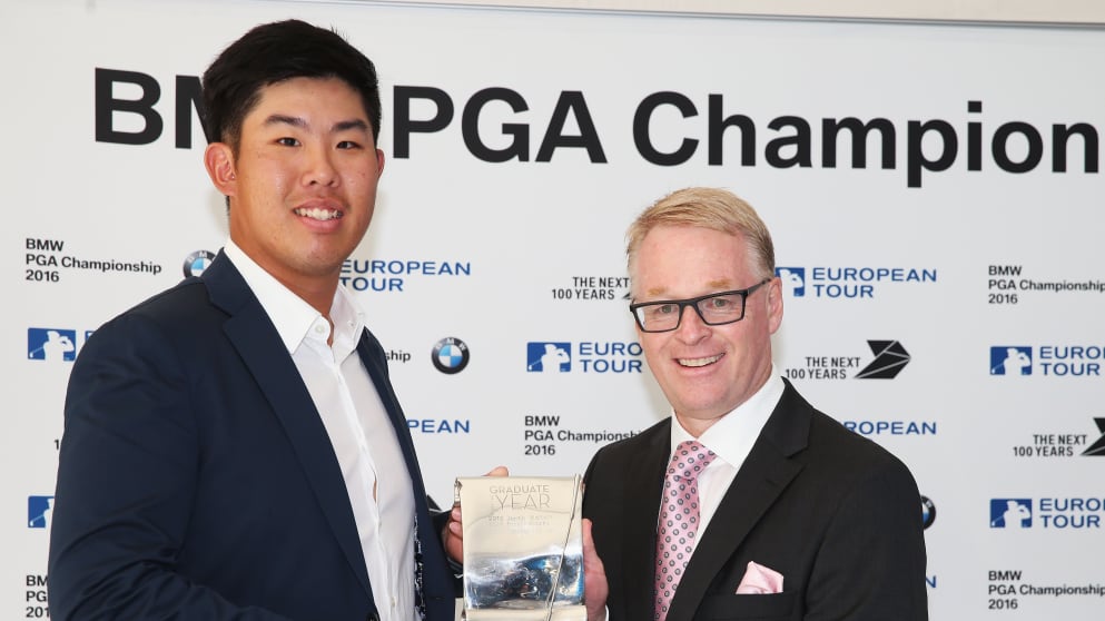 Defending Champion Byeong Hun An of South Korea receives the Challenge Tour Graduate of the Year award from The European Tour Chief Executive Keith Pelley during the BMW PGA Championship Reception