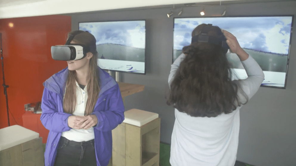 Fans enjoying live 360-degree footage at the KLM Open