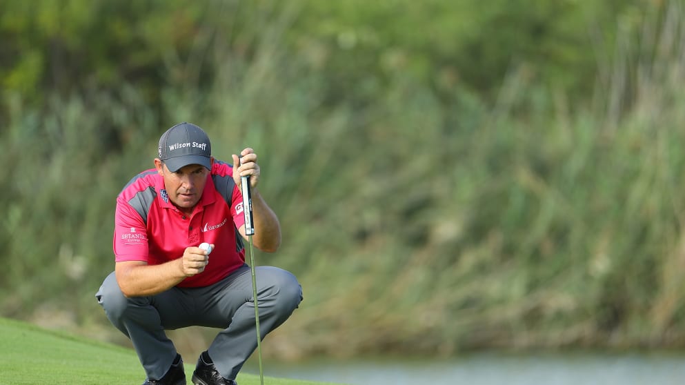 Padraig Harrington - lines up a putt on the 12th green during day three of the Portugal Masters 