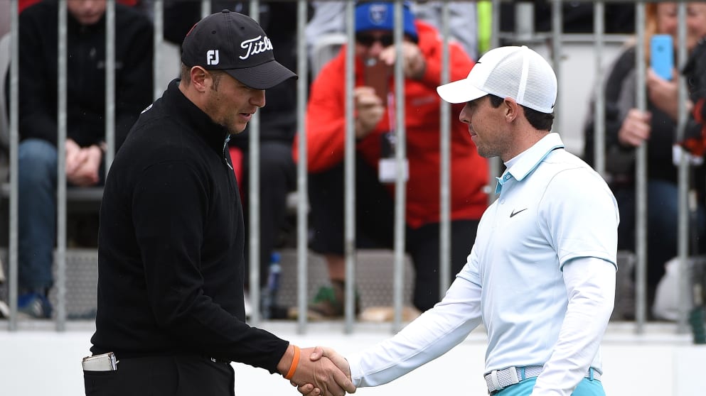 Rory McIlroy shakes hands with playing partner Matthew Southgate at the first tee on day three of the DDF Irish Open
