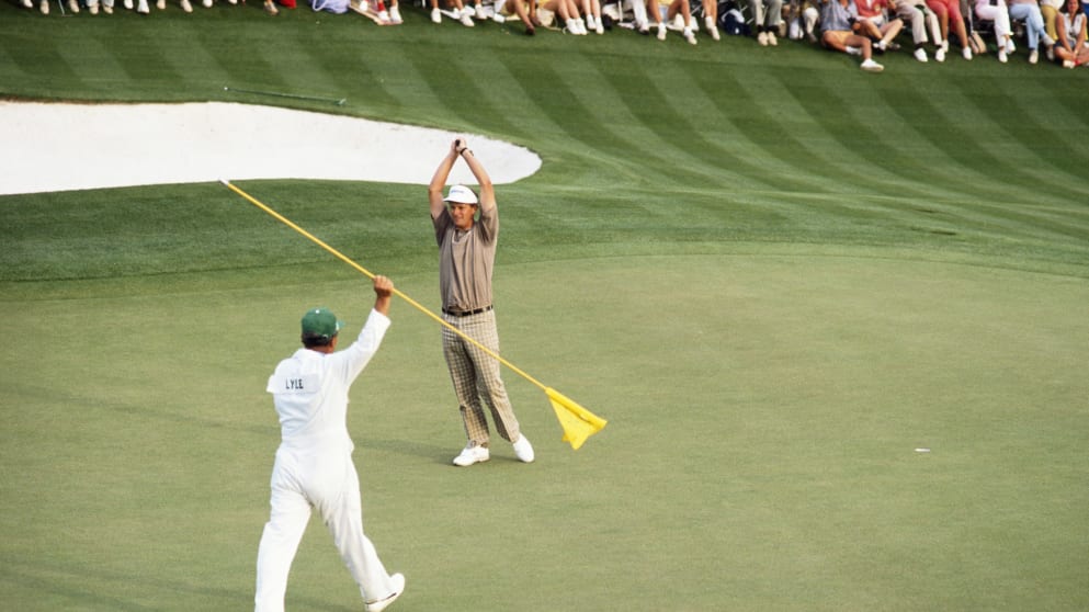 Sandy Lyle celebrates holing out for birdie on the 18th to claim the Green Jacket in 1988