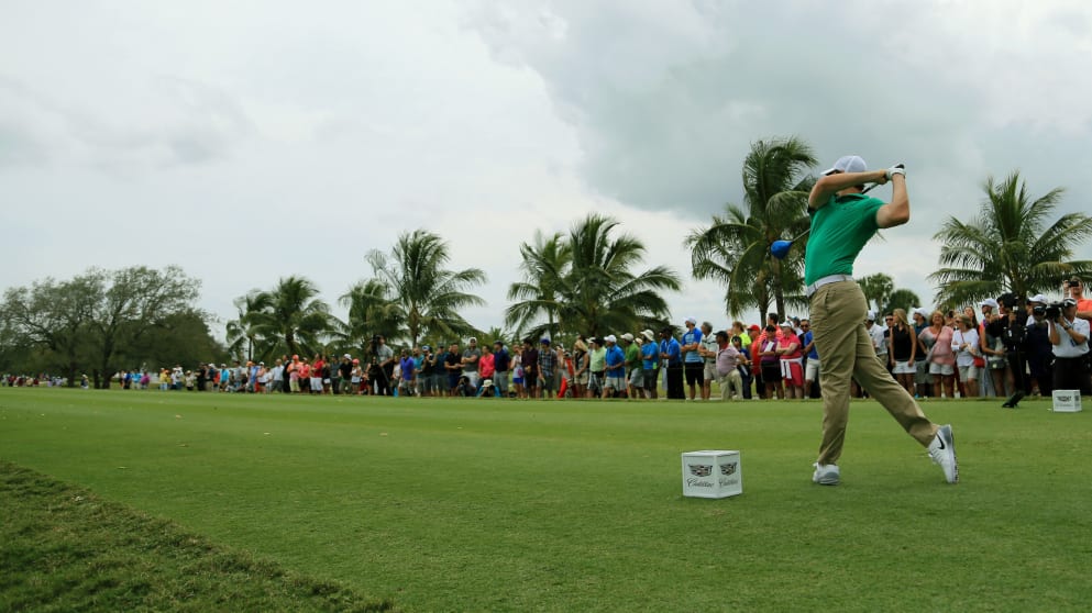 Rory McIlroy tees off on the eighth 
