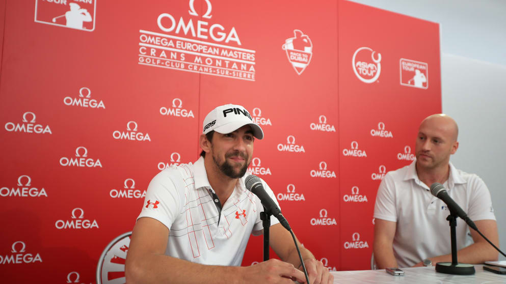 Former swimming legend Michael Phelps talks to the media ahead of participating in the pro-am for the Omega European Masters