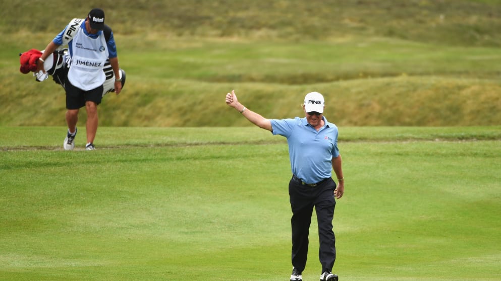 Miguel Angel Jimenez acknowledges the crowd on the 11th hole