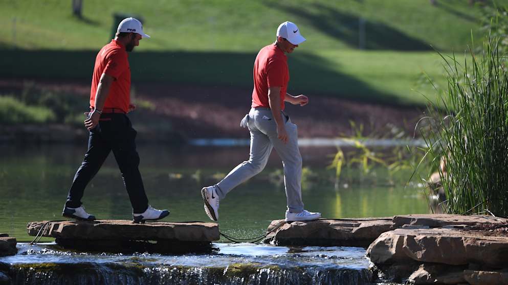 Rory McIlroy and Andy Sullivan en route to the 7th tee 