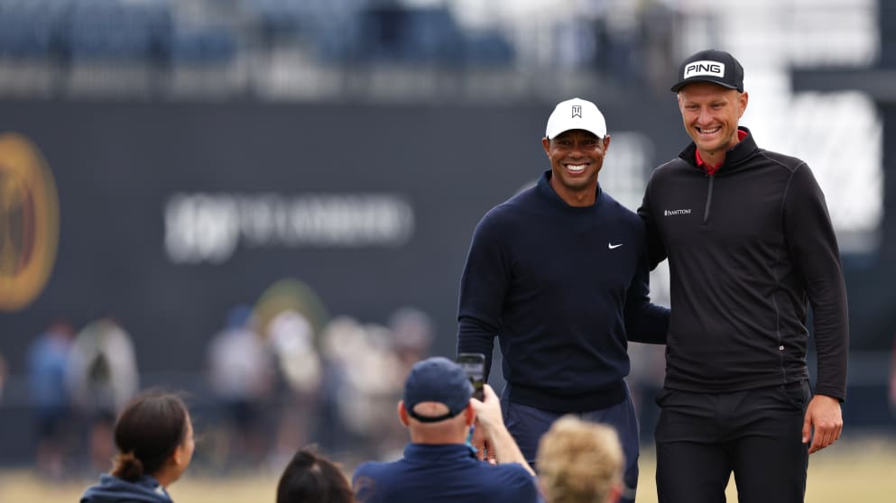 Tiger Woods and Adrian Meronk