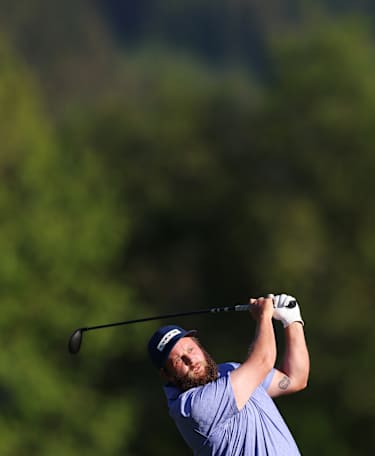 Johnston surges to the summit on day two