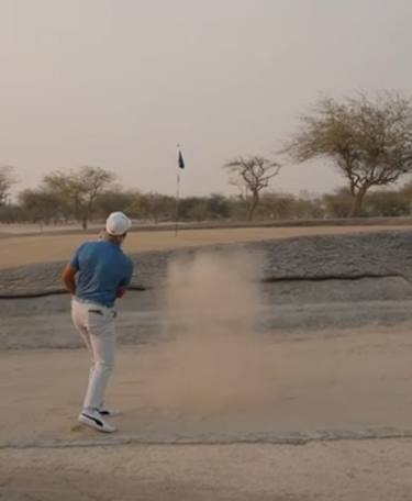 Daniel Hillier and David Micheluzzi try out sand golf at Bahrain's oldest course