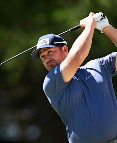 Lawrence leads in bid for Swiss hat-trick