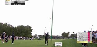 Rory Mcilroy hits a quality approach to the 14th Hole