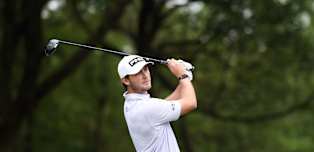 Brown eases to first round lead in Hangzhou