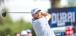 Shane Lowry and Nacho Elvira battle the elements to lead in Dubai