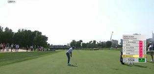 Rory McIlroy sets up birdie at the 14th