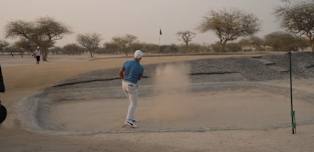 Daniel Hillier and David Micheluzzi try out sand golf at Bahrain's oldest course