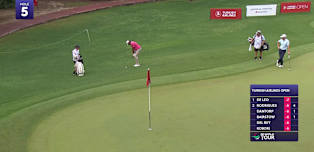 Eugenio Chacarra chips in at the 5th hole