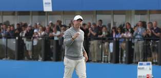 Rory McIlroy cheering on Shane Lowry to secure victory on home soil