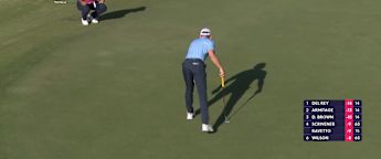 Alexander Björk holes long putt at 16th