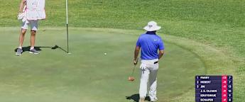 Jin putts through the rough at the 14th