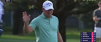 Shaun Norris makes a huge birdie putt to extend his lead