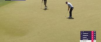 Chris Wood makes long-range par putt at the fifth